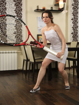 Wonderful Candice performs with her biggest tennis racket
